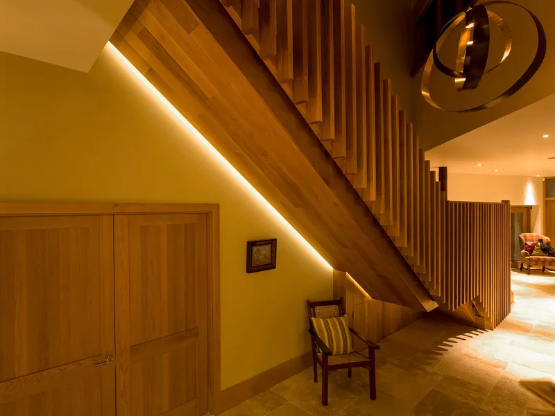 Underside of a staircase with linear LED