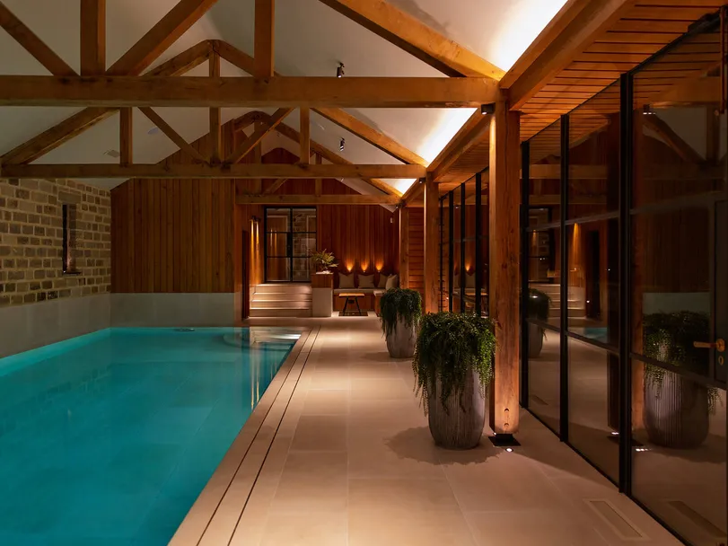 Swimming pool in a timber-beamed building - Ambient lighting scene