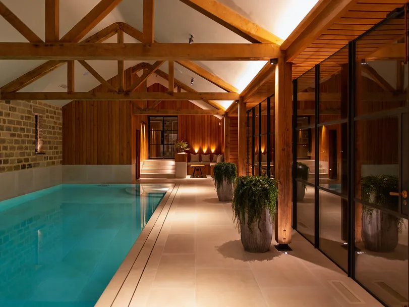 Swimming pool in a timber-beamed building - Bright lighting scene