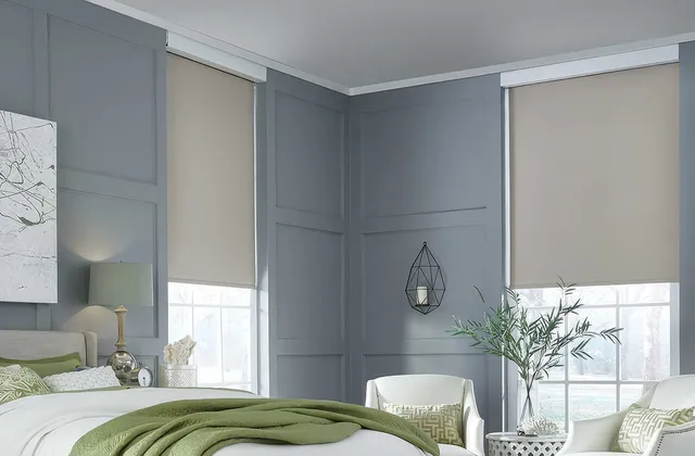 Lutron Sivoia QS roller blinds in a bright, airy bedroom